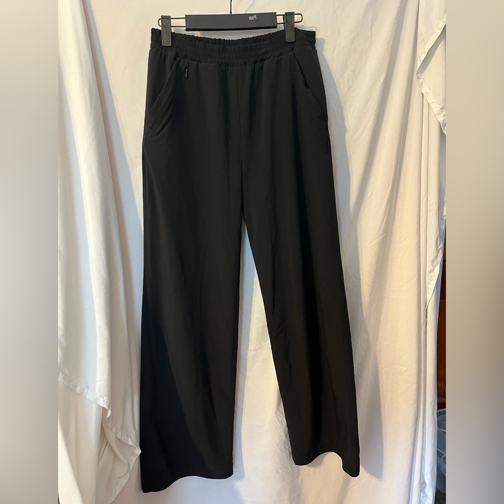 NICE! Athleta Girl black track pants. So soft and comfortable. Girls xxl
